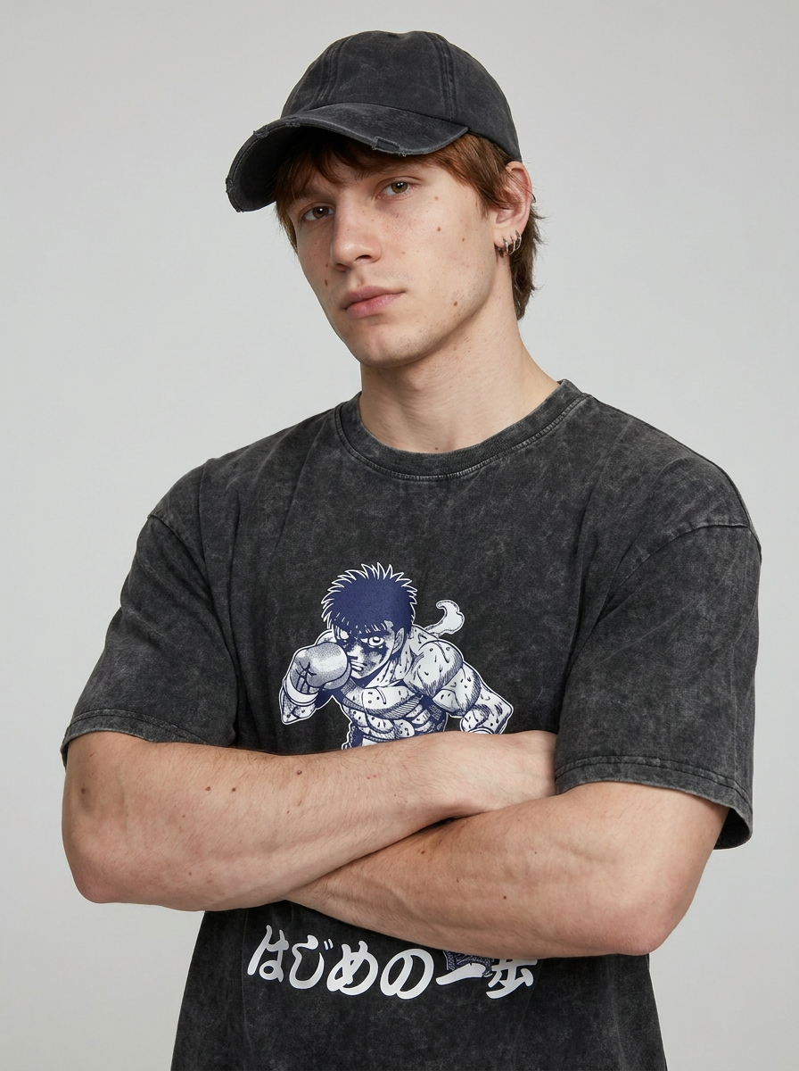 2024 Vintage Dark Anime Print Streetwear T-Shirt on model arms crossed — washed black t-shirt | Tempus Arc premium anime streetwear