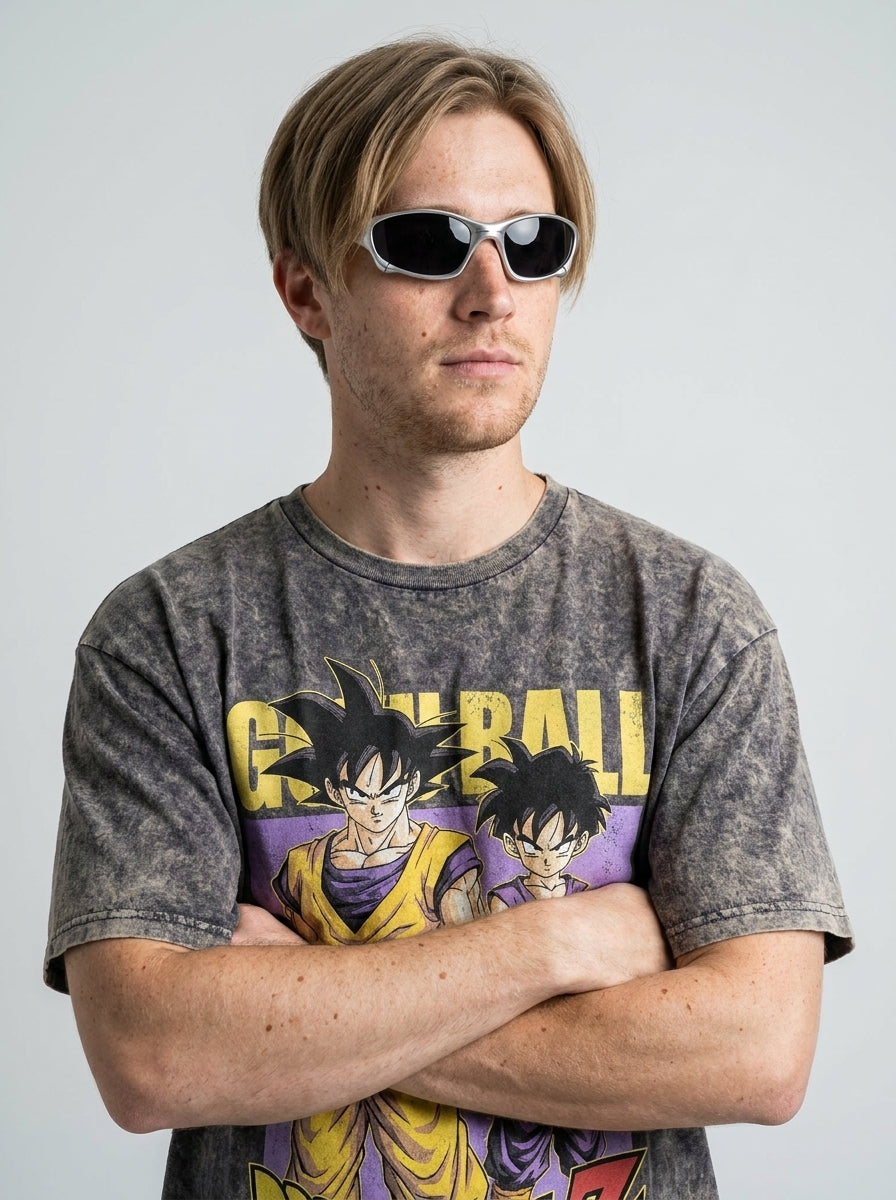 Dragon Ball Goku & JoJo's Bizarre Adventure T-Shirt Collection on model arms crossed — washed black t-shirt | Tempus Arc premium anime streetwear